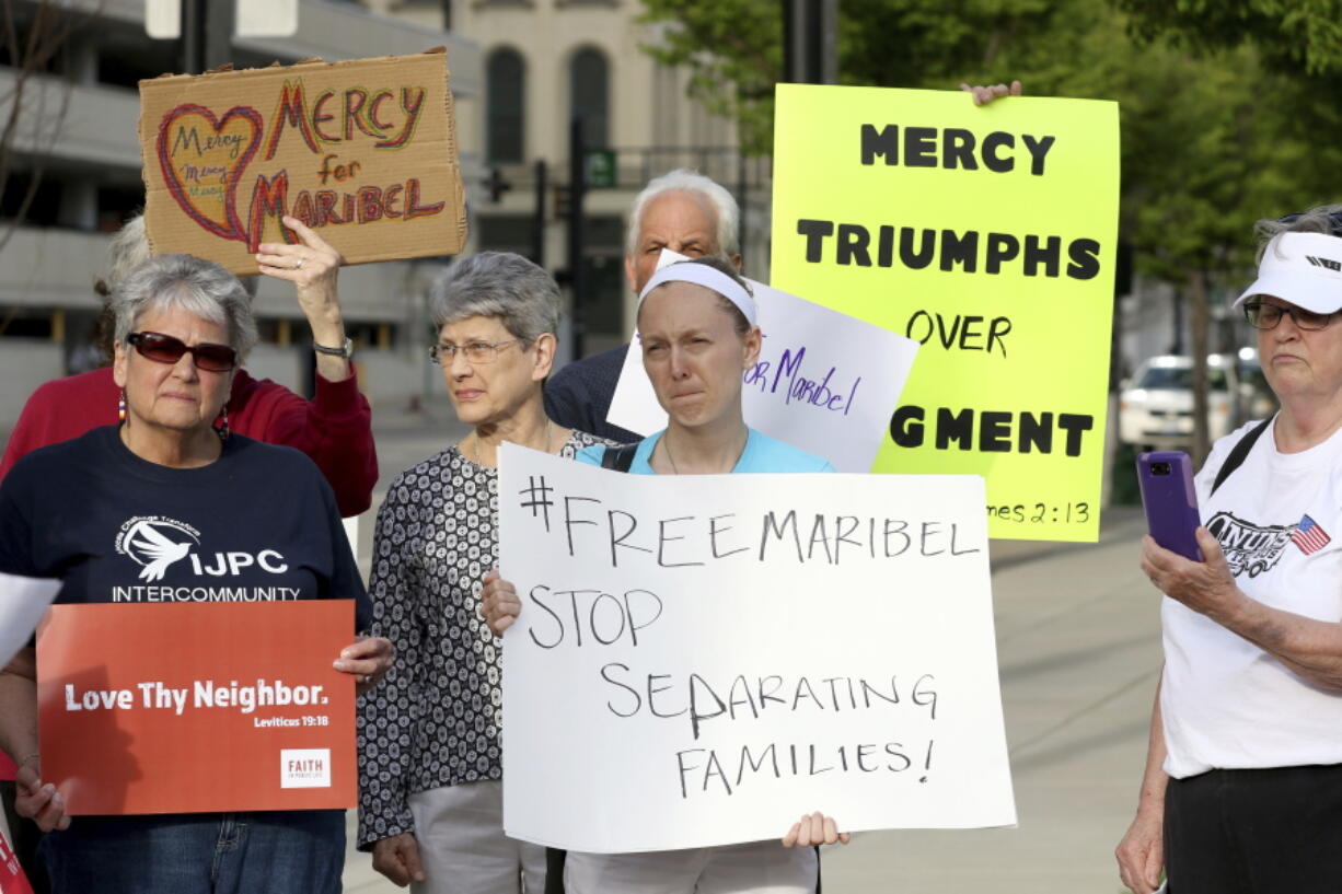 People protest Monday in Cincinnati against the deportation of Maribel Trujillo Diaz, a mother of four U.S.-born children.