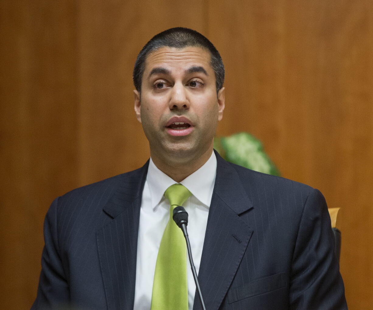 Federal Communication Commission Commissioner Ajit Pai speaks in 2015 during an open hearing and vote on &quot;Net Neutrality&quot; in Washington.