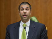 Federal Communication Commission Commissioner Ajit Pai speaks in 2015 during an open hearing and vote on &quot;Net Neutrality&quot; in Washington.