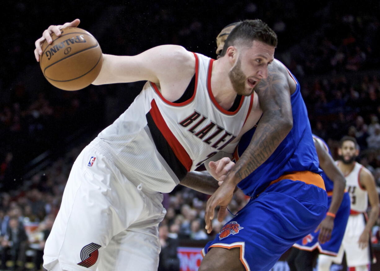 Portland Trail Blazers center Jusuf Nurkic, left, is still an unknown for the playoffs as he recovers from an injury.