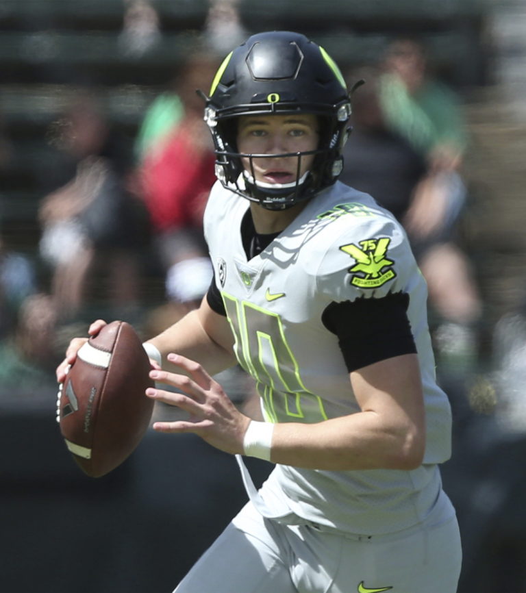 Oregon quarterback Justin Herbert looks for a receiver during Oregon's spring NCAA college football game at Autzen Stadium in Eugene Ore., Saturday, April 29, 2017.