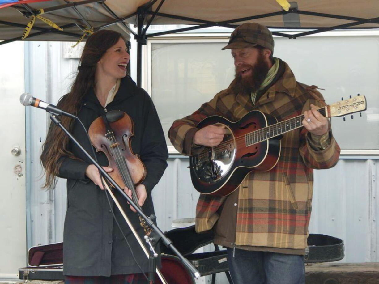 Matt and Rachel Wilson who also perform as a folk duo known as Wampus Cat., perform in Oregon.