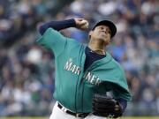 Seattle Mariners starting pitcher Felix Hernandez throws against the Texas Rangers during the first inning of a baseball game Friday, April 14, 2017, in Seattle.