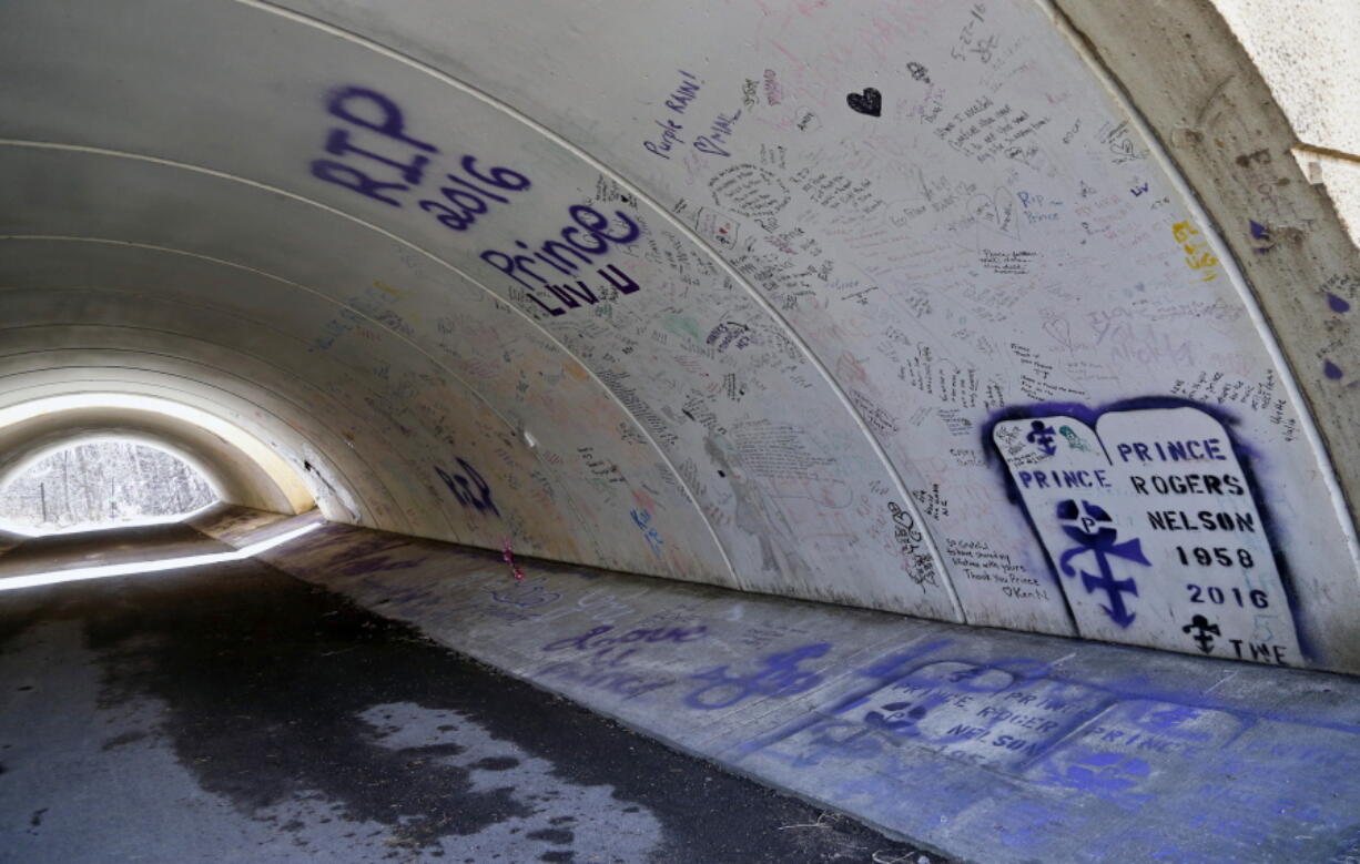 In this April 4, 2017 photo, graffiti memorials to the late Prince mark the Riley Creek underpass which has become the new graffiti bridge in Chanhassen, Minn. Fans have been marking it since the rock star&#039;s death from an accidental overdose on April 21, 2016.