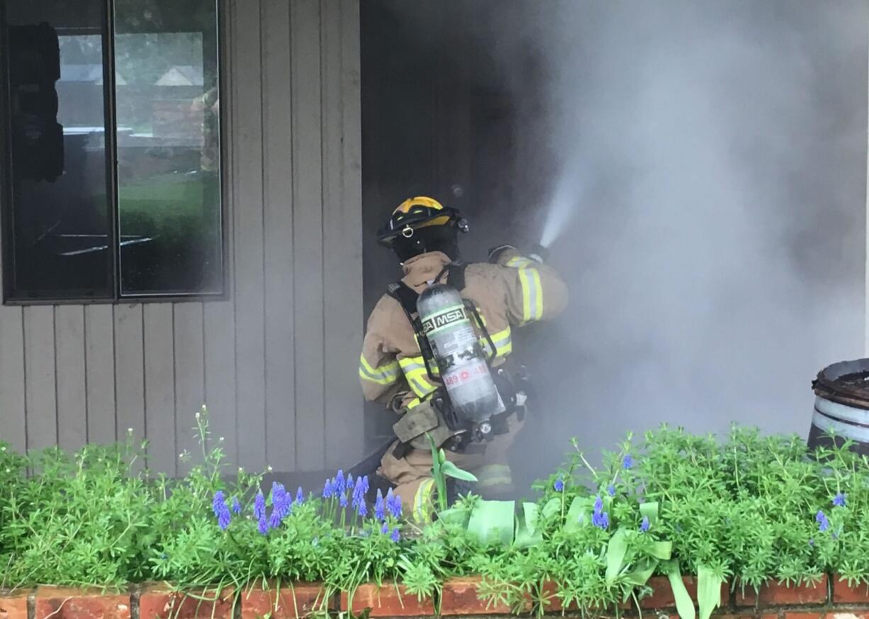 Firefighters quickly gained control of a house fire in Ridgefield Saturday morning but flames inflicted heavy damage. No one was home at the time of the fire.