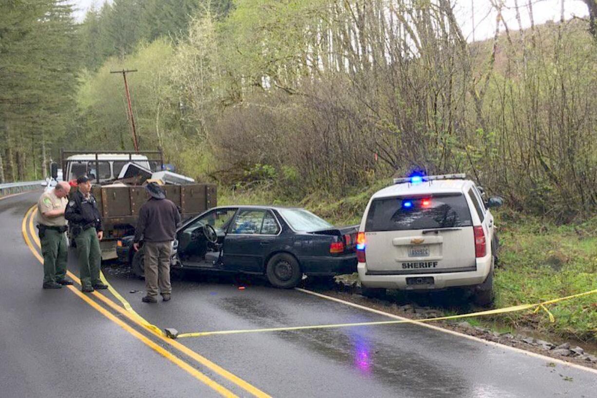 Two people were taken into custody Thursday after a driver allegedly tried to run over a Clark County Sheriff's Office deputy. The deputy fired on the vehicle, which fled but was found about 90 minutes later.