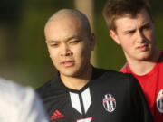 Kleon Keang stands with his Union teammates before a soccer game against Camas.