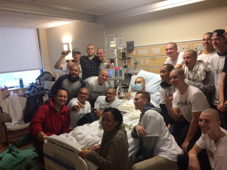 Members of the Vancouver-based Pacific FC Soccer Club pose with Union High School senior Kleon Keang at Kaiser Sunnyside Medical Center on Feb. 18. The players shaved their heads in support of Kleon, who had leukemia.