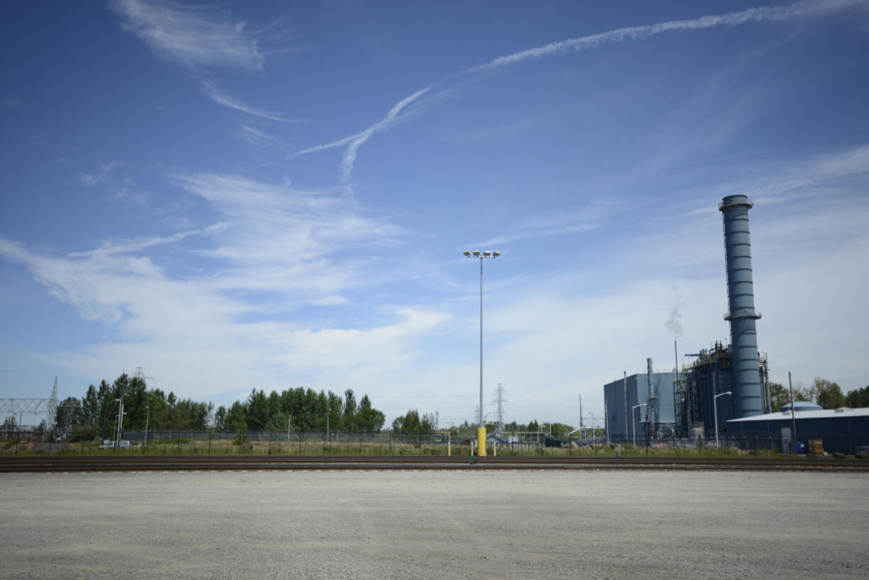 The location where a Vancouver Energy facility may be built at Terminal 5 at the Port of Vancouver, is seen on Friday July 1, 2016. The Clark County Public Utilities Steam Generating plant is to the right.