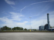 The location where a Vancouver Energy facility may be built at Terminal 5 at the Port of Vancouver, is seen on Friday July 1, 2016. The Clark County Public Utilities Steam Generating plant is to the right.