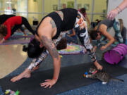 Jessica Almendares during the first yoga with cats workshop, April 22 at Miami Dade Animal Services in Doral, Fla.