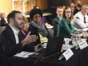 Executive Director of the Council for the Homeless Andy Silver, left, speaks May 1 about homelessness in Vancouver to the Vancouver City Council and the Board of County Councilors at the Vancouver Community Library.