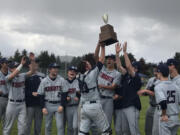 Meg Wochnick/The Columbian
The King’s Way Christian baseball team celebrates its district championship Saturday in Castle Rock.