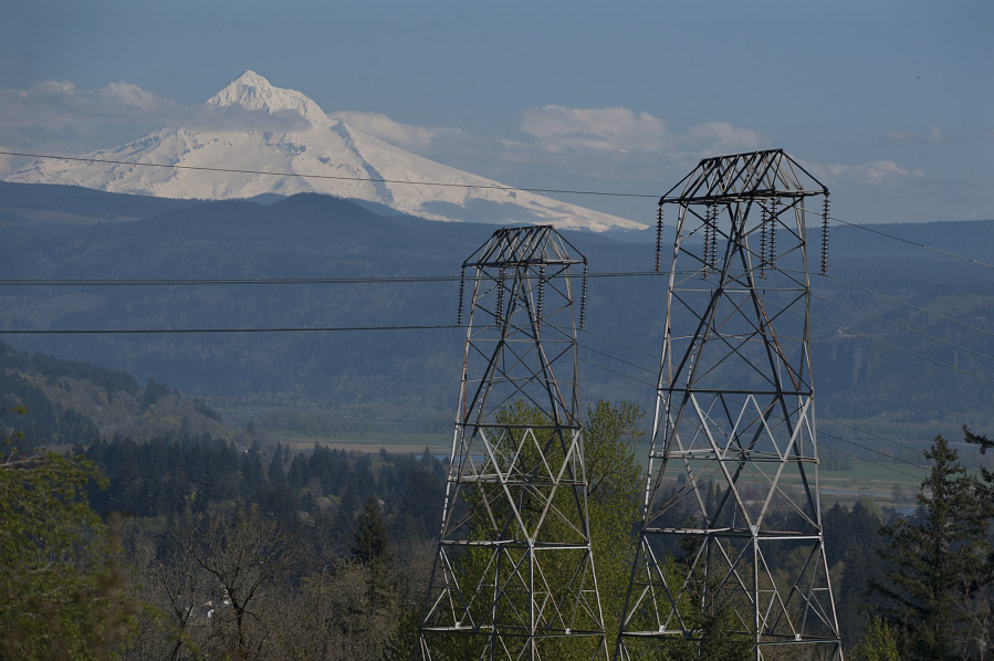 High-voltage power lines are seen in this view looking east from Oak Creek Park with Mount Hood in the background April 1, 2016, in Camas.