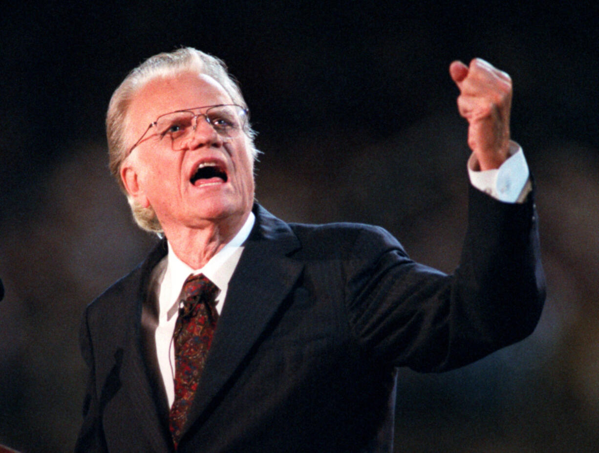 Billy Graham preaches during his 1996 crusade in his hometown of Charlotte, N.C.