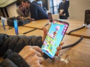 Visitors to the Samsung 837 showroom in New York admire the Samsung Galaxy S8+ smartphone on April 1. Richard B.