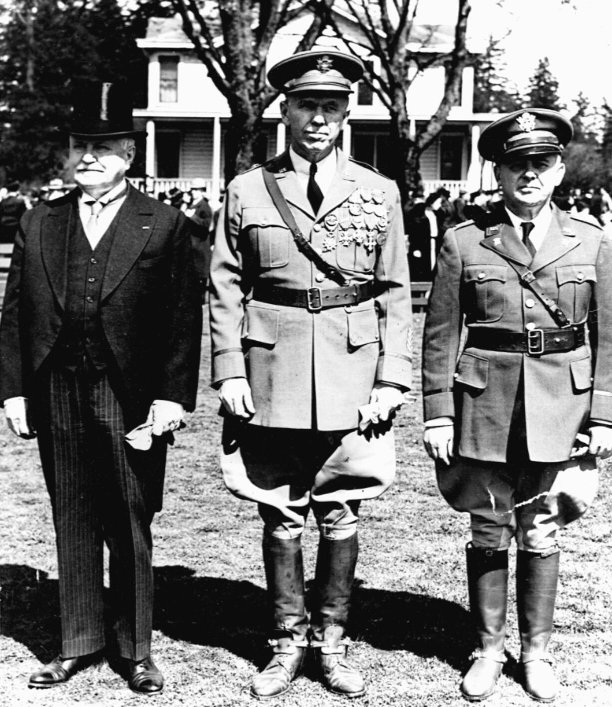 Washington Gov. Charles H. Martin, left, Brig. Gen. George C. Marshall and Capt. Joseph K. Carson Jr., Vancouver’s mayor, stand in review at the Vancouver Barracks. Marshall supervised Civilian Conservation Corps work in the Northwest as barracks commandant between 1936 and 1938. He later served as U.S. Army Chief of Staff during World War II, as Secretary of State and the architect of European economic recovery following WWII, and as Secretary of Defense during the Korean War. In 1953, he was awarded the Nobel Peace Prize for his role in proposing, encouraging legislative action, and supporting the European Recovery Program (known as the Marshall Plan).