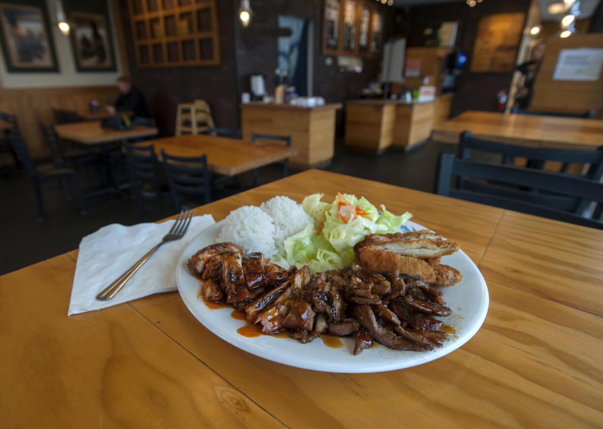 A combination plate of spicy chicken, from left, pork and chicken katsu is served at Joy Teriyaki in Hazel Dell.