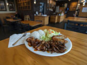 A combination plate of spicy chicken, from left, pork and chicken katsu is served at Joy Teriyaki in Hazel Dell.