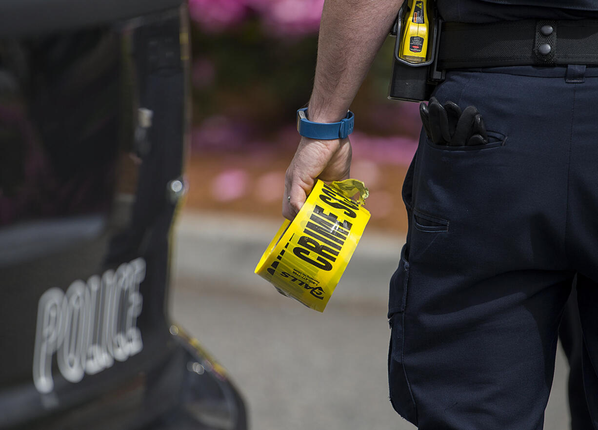 Police respond to the scene of a shooting at PeaceHealth Southwest Medical Center in May 2017.