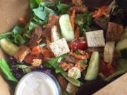 Grab a quick lunch in a box with a large salad from Low Bar.