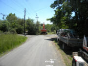 Construction crews have begun work on a county project that will connect two sections of N.E. 10th Avenue that are separated by Whipple Creek.