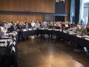 The Vancouver City Council and the Clark County council discuss homelessness during a meeting Monday evening at the Vancouver Community Library.