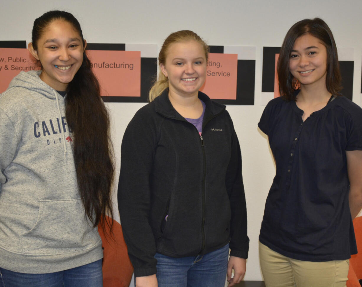 Washougal: Washougal High School students, from left, Rosemarie Coburn-Valadez, Colbi Huff and Phoebe Walker, who were honored with certificates from the American Association of University Women for their success in various science, technology, engineering and math classes.