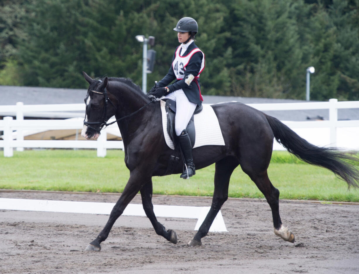 Camas: Desiree Fisher and her horse, Goose, brought home a gold medal from the Washington State High School Equestrian Teams state meet, and will participate in the regional competition beginning Friday.