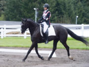 Camas: Desiree Fisher and her horse, Goose, brought home a gold medal from the Washington State High School Equestrian Teams state meet, and will participate in the regional competition beginning Friday.