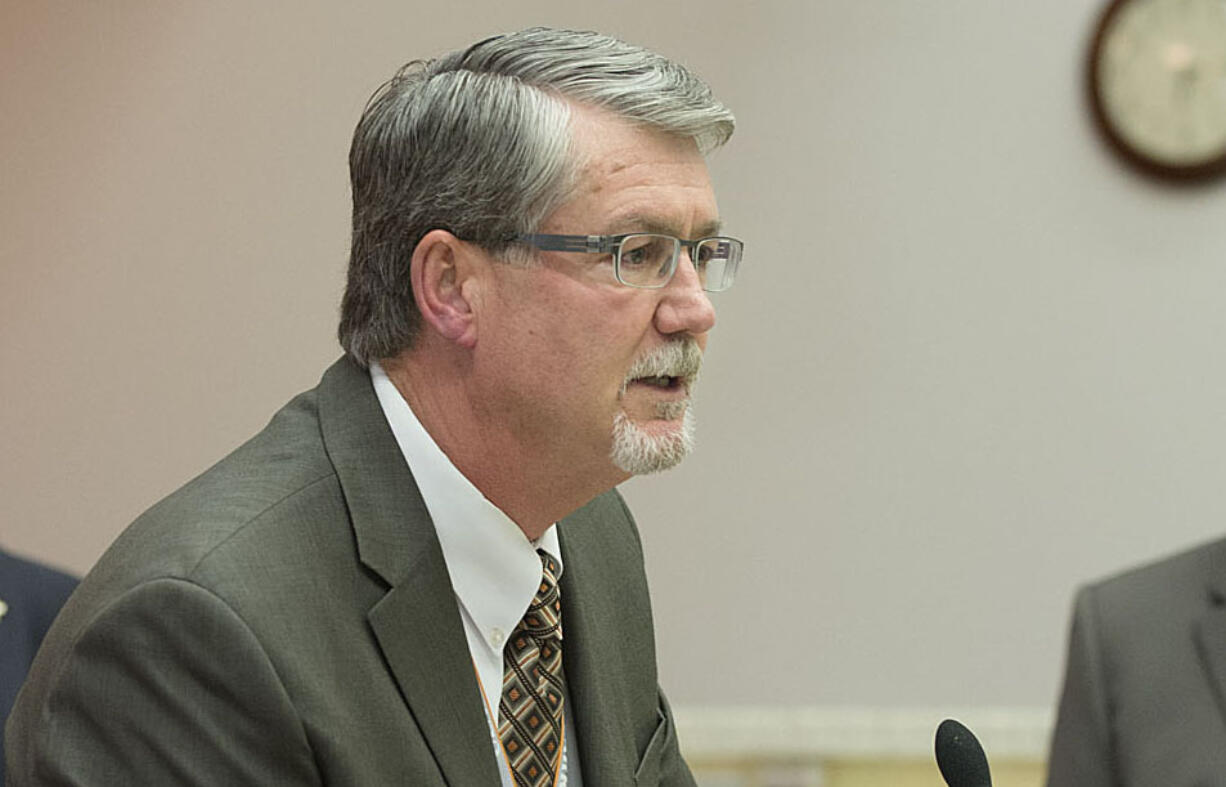 County Manager Mark McCauley, center, speaks to the crowd after accepting an award in honor of National County Government Month on April 5, 2016, at the Clark County Public Service Center.