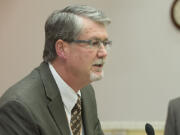 County Manager Mark McCauley, center, speaks to the crowd after accepting an award in honor of National County Government Month on April 5, 2016, at the Clark County Public Service Center.