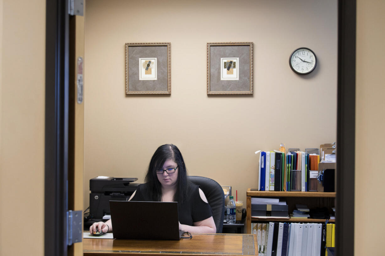 Marissa Riddall starts her workday in her office at the Clark County CNA Training Center. Riddall began working at the school after attending the program through Educational Service District 112&#039;s Connect 2 Careers program.