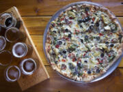 A Railyard pizza is served at RailSide Brewing in Hazel Dell.