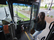 Mountain View High School junior Kaylee Hollingsworth, 17, boards the bus along Northeast 136th Avenue using her Youth Opportunity Pass on her way to school Wednesday.