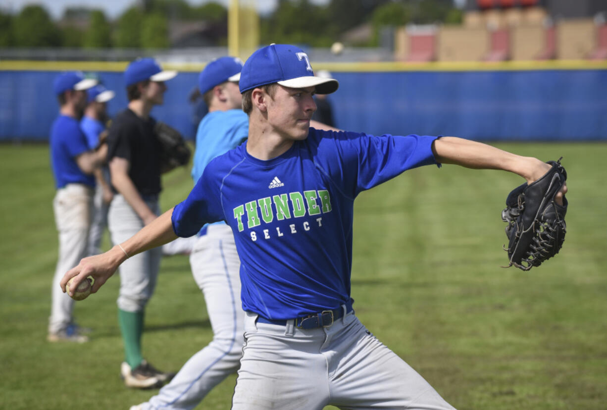 Mountain View High School student Hayden Minich pitches to a teammate during practice at Mountain View High School, Thursday May 18, 2017.