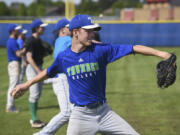 Mountain View High School student Hayden Minich pitches to a teammate during practice at Mountain View High School, Thursday May 18, 2017.