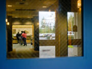 People wait in the lobby at Columbia River Mental Health Services on Friday. Columbia River Mental Health Services, the oldest provider of behavioral health services in Clark County, is celebrating its 75th anniversary this year.