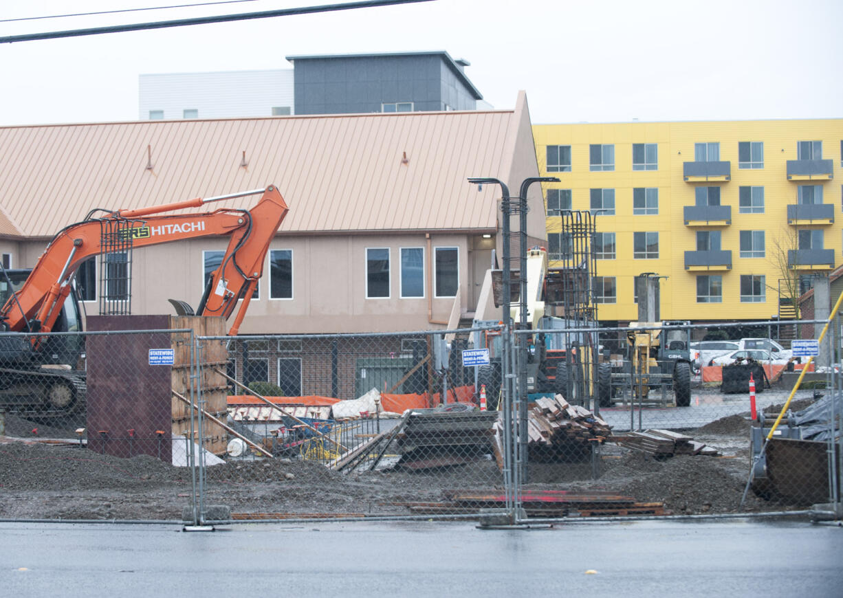 Construction takes place at 13 West Apartments as a 15 West Apartments is seen in the background in Vancouver in February. The apartments will add to the low-income housing in the downtown area.  Housing was one of the top issues people responding the low-income survey said they needed assistance with.