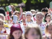 Eisenhower Elementary School third-graders march together Friday in the annual Children’s Culture Parade at Fort Vancouver National Historic Site.