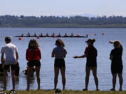 Fans watch from the shore at the U.S. Rowing Northwest Youth Championships at Vancouver Lake.