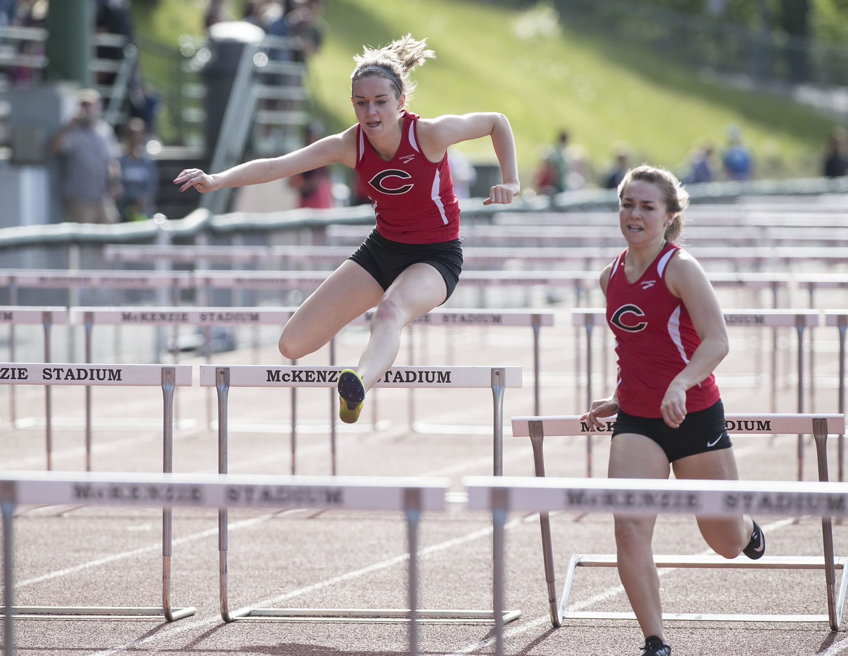 Camas High Schools Cambryn Gulzow competes in the 4A girls 100 hurdles during the 3A-4A District track meet at McKenzie Stadium, Wednesday May 10, 2017.