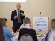 Joel Ryan, executive director of Washington State Association of Head Start and ECEAP, speaks to the crowd during the sixth annual Early Learning Champions Awards Luncheon at Club Green Meadows on Wednesday afternoon.