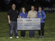 La Center: The Organization Dedicated to Athletics & Youth (TODAY) Foundation awarded a $20,000 Clark W. Murphy donation to the La Center Education Foundation. From left: Matt Cooke, La Center School District director of athletics and activities, La Center Education Foundation Vice President Madi Deotsch, Gordy Myers, T.O.D.A.Y. Foundation vice president, and La Center Education Foundation President Staci Firl.