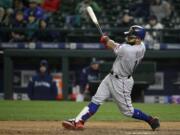 Texas Rangers' Rougned Odor hits a go-ahead two-run home run in the 13th inning of a baseball game against the Seattle Mariners, Friday, May 5, 2017, in Seattle. (AP Photo/Ted S.