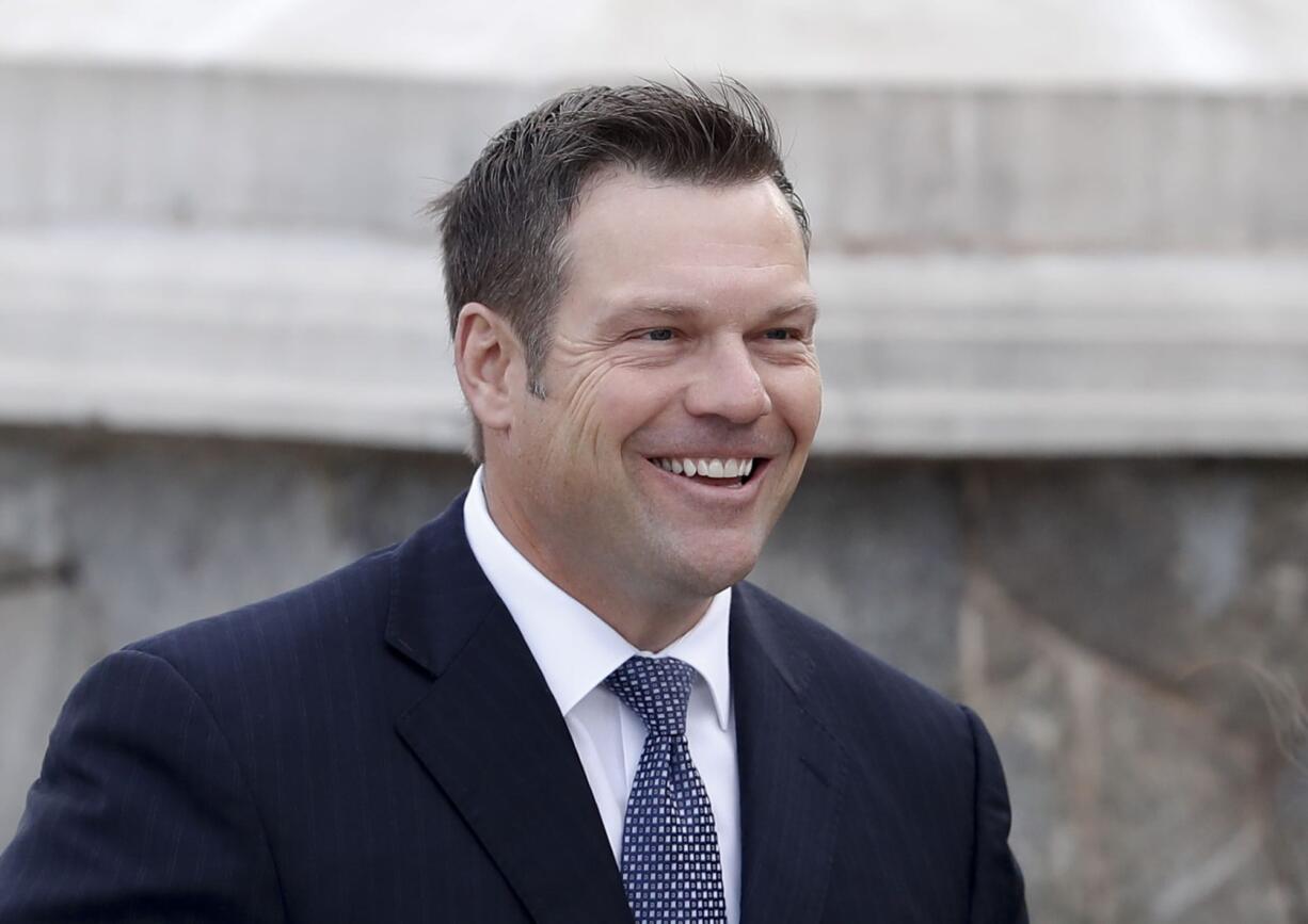 FILE - In this Nov. 20, 2016 file ;photo, Kansas Secretary of State, Kris Kobach is seen in Bedminster, N.J. President Donald Trump is expected to sign an executive order launching a commission to review alleged voter fraud and voter suppression in the U.S. election system, three White House officials said. Kobach and Vice President Mike Pence will lead the commission, which will look at allegations of improper voting and fraudulent voter registration in states and across the nation.