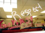 A hand-painted message is written on a classroom window at Forest Grove High School in Forest Grove, Ore., May 4, 2017. Experts who have treated young sexual offenders stress the value of early intervention, and research cites the importance of a culture that encourages students to report incidents without fear of retaliation and with the expectation that adults will do the right thing.