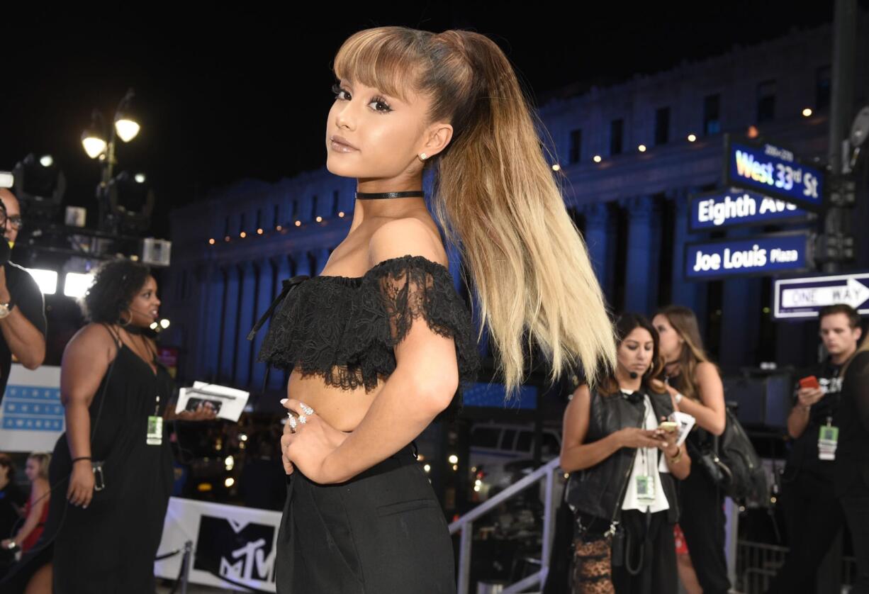 FILE - In this Aug. 28, 2016 file photo, Ariana Grande arrives at the MTV Video Music Awards in New York. Police say there are "a number of fatalities" after reports of an explosion at an Ariana Grande concert at Manchester Arena in northern England on Monday, May 22, 2017..