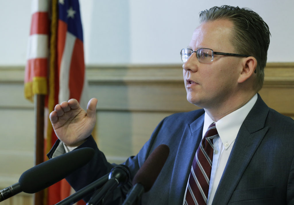 Chris Reykdal, Washington's Superintendent of Public Instruction, talks to reporters, Wednesday, May 24, 2017, in Olympia, Wash. (AP Photo/Ted S.