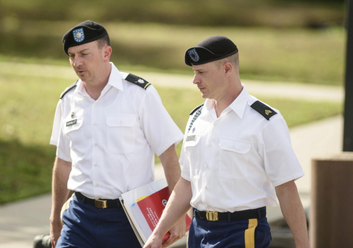 Army Sgt. Bowe Bergdahl, right, and his military attorney, Lt. Col. Franklin Rosenblatt, arrive for a preliminary motions hearing on Friday, May 5, 2017, at the courtroom facility on Fort Bragg, N.C. A military judge in North Carolina could set a new timetable for the desertion case against Bergdahl at the pre-trial hearing nearly three years after the soldier&#039;s return from captivity. Bergdahl, of Hailey, Idaho, left his post in Afghanistan in 2009 and was held by the Taliban and its allies about five years.